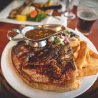 Enjoy a massive steak at the Hair of the Dog Inn | Tim Charody