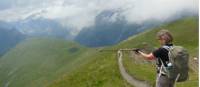 On the Mont de la Saxe route in Italy, opposite the Mont Blanc range, pointing down to Courmayeur, still many hours ridge-walking away. |  <i>Jeremy Bourke</i>