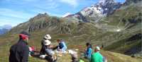 Hikers taking a rest and absorbing the incredible views around Mont Blanc | Kerren Knighton