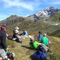 Hikers taking a rest and absorbing the incredible views around Mont Blanc | Kerren Knighton