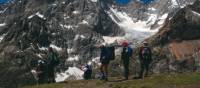 Trekkers on the crest of the Grand Col Ferret (2537m) on the Mont Blanc Circuit | Sue Badyari