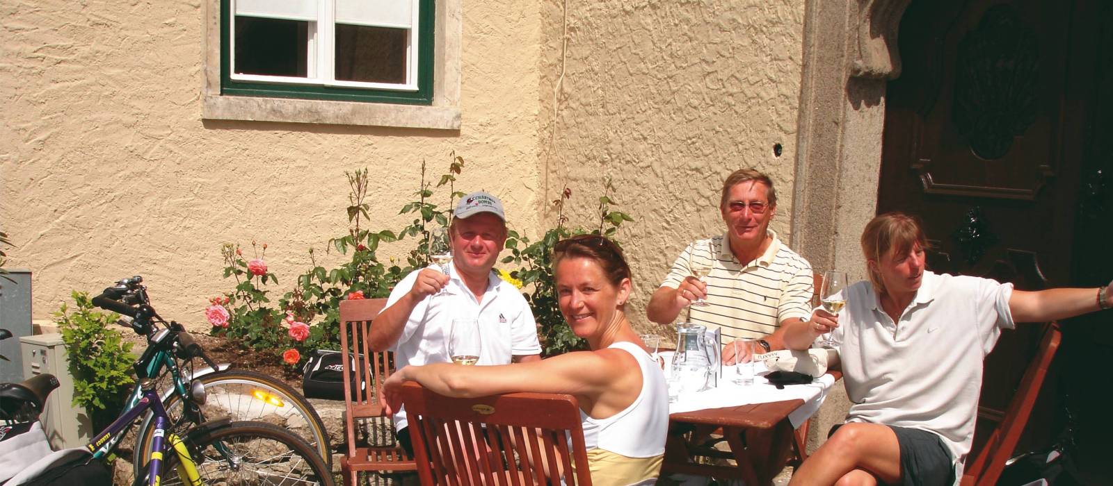 Cyclists enjoying wine tasting in the Wachau Valley, Austria | Kate Baker