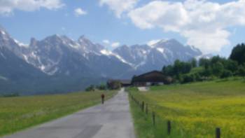 Ride with the Austrian Alps as your backdrop