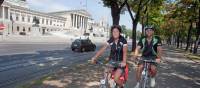 Cycling past Parliament in Vienna