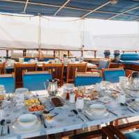 al fresco breakfast onboard Thalassa in the Greek Islands