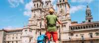 A pilgrim admires the incredible architecture of the Cathedral of Santiago de Compostela.
