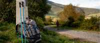 Backpack and walking poles on the Camino