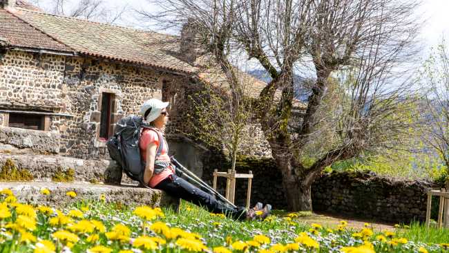 A pilgrim rests near Aubrac on the Le Puy Camino in France