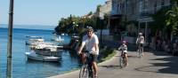 Cycling past boats on the Croatian islands with kids | Ross Baker