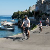 Cycling past boats on the Croatian islands with kids | Ross Baker