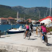 Children cycling into the town of Jelsa on the island of Hvar | Ross Baker