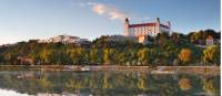 Bratislava castle with reflection in river Danube