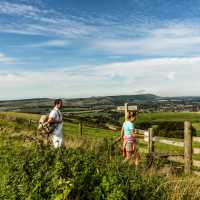 Walkers following the South Downs Way in East Sussex. | Andrew Pickett