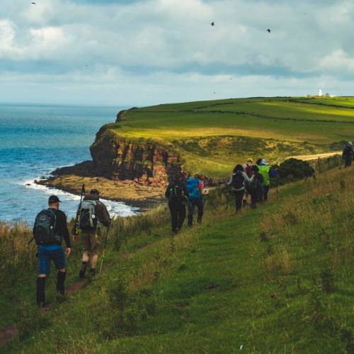 Beginning the Coast to Coast walk along the green cliffs of England