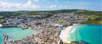Porthmeor Beach and the town of St Ives in Cornwall. | Tim Charody