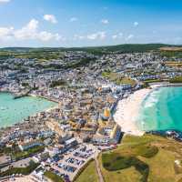 Porthmeor Beach and the town of St Ives in Cornwall. | Tim Charody