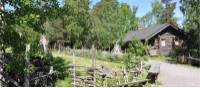 Cycle past small cottages in delightful villages in Finland