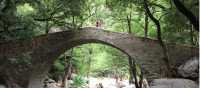 Crossing a magnificent stone bridge in Corsica | Kate Baker