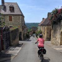 Cycling in the village of Domme | Rob Mills