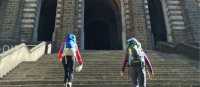 Hikers on the steps of the cathedral in Le Puy en Velay, the traditional start of the Way of St James | Kate Baker