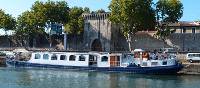 The L'Estello barge docked in Provence, France