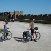 Cyclists on the ramparts of Carcassonne | Kate Baker