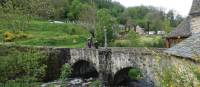 Pilgrims crossing the UNESCO listed bridge at St Chely d'Aubrac | Rob Mills