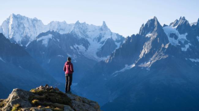 A hiker admires the mountain views near Chamonix