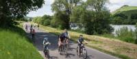 Family cycling along the Moselle Bike Path in Germany