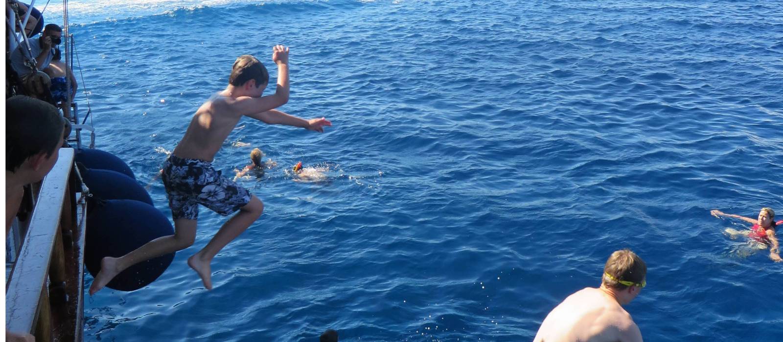 Kids jumping into the warm Ionian waters in Greece | Gordon Steer