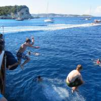 Kids jumping into the warm Ionian waters in Greece | Gordon Steer