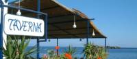 Tavern overlooking the water in Loutro, Crete | Hetty Schuppert