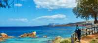 Walk the stunning azure coastline of Chania while on the island of Crete, Greece.