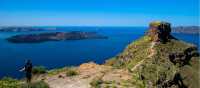 Looking out at Nea Kameni, a volcanic island located in the Santorini caldera in Greece.