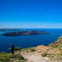 Looking out at Nea Kameni, a volcanic island located in the Santorini caldera in Greece.