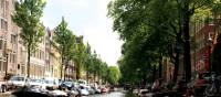 Views down the beautiful canals in Amsterdam | Nick Kostos