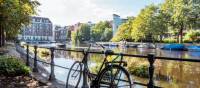 Park your bike alongside a Dutch canal in Amsterdam | Koen Smilde