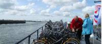 Preparing the bikes on the barge |  <i>Richard Tulloch</i>