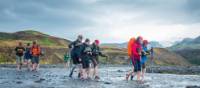 Crossing a river on the Laugavegur Trail in Iceland