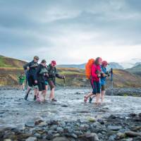 Crossing a river on the Laugavegur Trail in Iceland