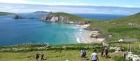 Hikers walking down to Coumeenoole Bay, Dingle