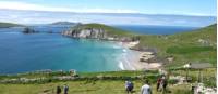 Hikers walking down to Coumeenoole Bay, Dingle