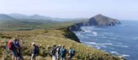 Hikers by the ocean, Dingle Peninsula