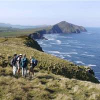 Hikers by the ocean, Dingle Peninsula