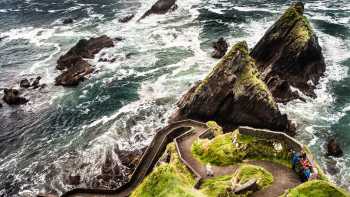 Walking to the edge of the spectacular Dingle Peninsula in Ireland. | Christian Birkholz