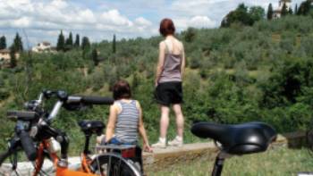 Cyclists taking in the Tuscan view