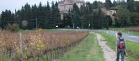 Hiker on the Via Francigena between Col di Val d'Elsa and Monteriggioni | Kate Baker