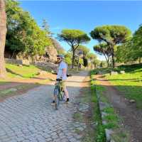 Cyclist on the Appian Way or Via Appia | Kate Baker