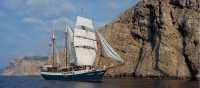 The Atlantis with full sails, making its way by wind power along the coast of Tuscany