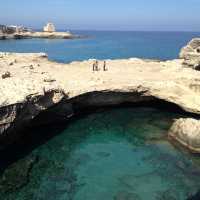 Half way along the coast between Lecce and Otranto, a magnificent rock pool connected to the sea | Kate Baker